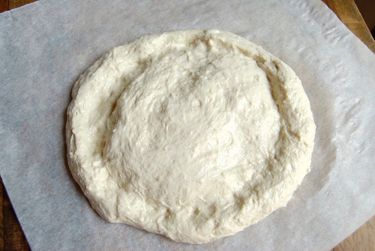 Turn no-knead bread dough into pizza crust via @kingarthurflour
