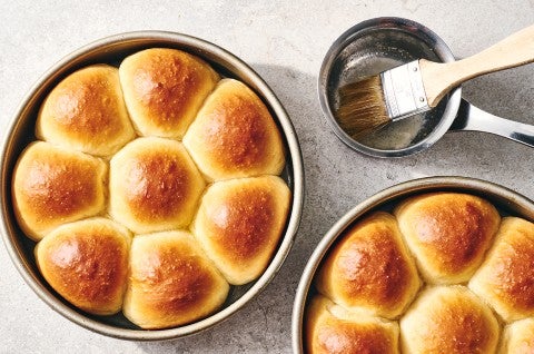 Golden Pull-Apart Butter Buns and a brush with clarified butter for topping - select to zoom