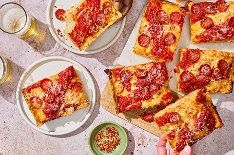 Slices of Weeknight Detroit Pizza on a table, shown from above. - select to zoom