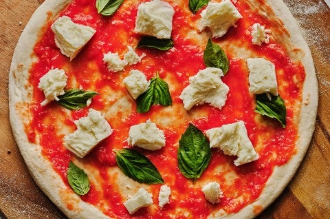 Margherita Pizza before baking. - select to zoom