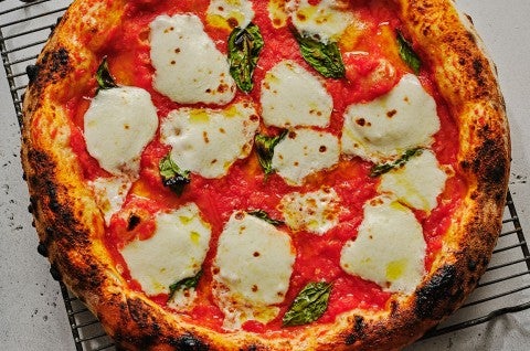 Margherita Pizza fresh out of the oven - select to zoom