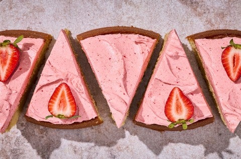 5 slices of Brown Sugar Strawberry Frosted Cake aligned on a counter - select to zoom