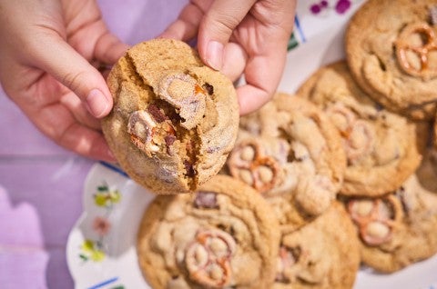 Breaking a Malted Peanut Butter Chocolate Chip Cookie to show the interior - select to zoom