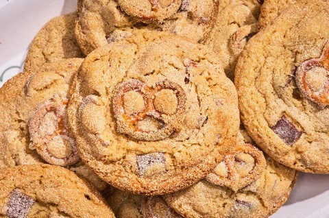 Malted Peanut Butter Chocolate Chip Cookies stacked on a plate - select to zoom