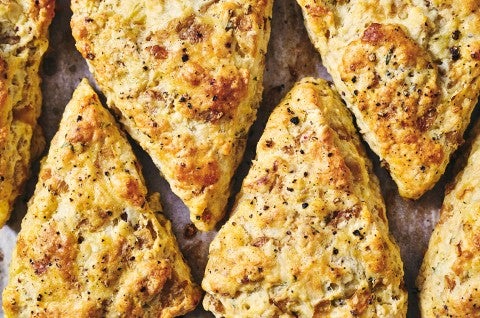 French Onion Scones arranged in an alternating pattern seen from above - select to zoom