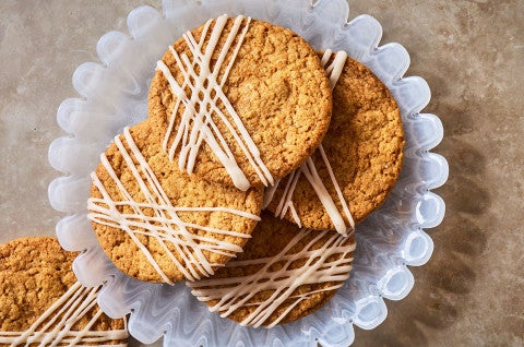 Crispy Brown Butter Cookies arranged on a plate - select to zoom