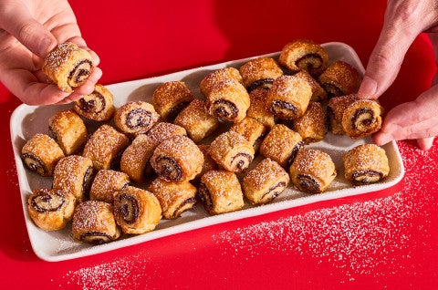 Chocolate Croissant Cookies on a small platter - select to zoom