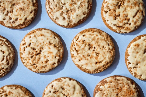 Gingerbread Latte Cookies arranged on a blue surface - select to zoom