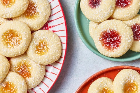 Almond Thumbprints arranged on colorful plates - select to zoom