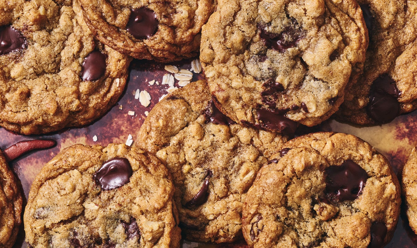 Whole wheat oatmeal cookies arranged on a counter and seen from above