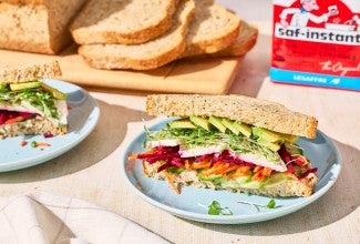 A sandwich made with Golden Grains Bread