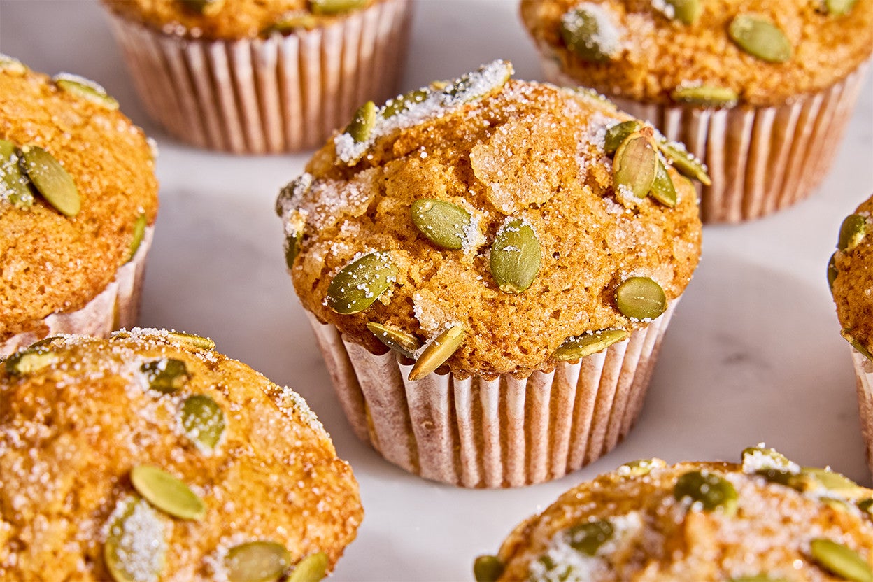 A bunch of Easy Pumpkin Muffins on a table