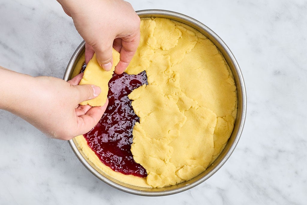Completing the top crust of Gâteau Breton