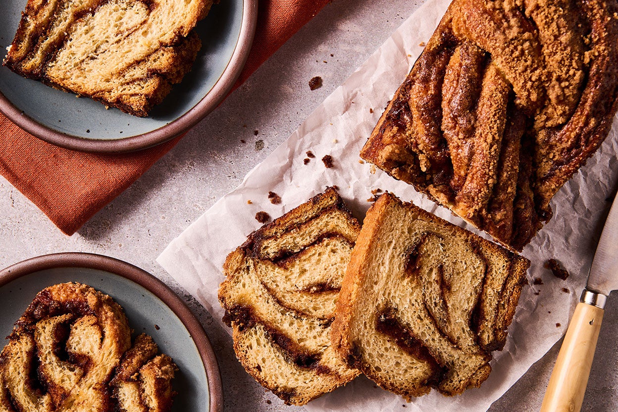 Cinnamon Babka slices arranged on a counter with thick swirls of cinnamon