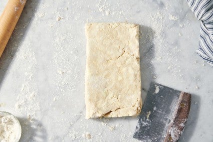Pie dough that has been cut and stacked to make layers
