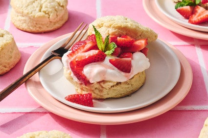 Self-Rising Cream Biscuits made into a shortcake topped with strawberries and whipped cream