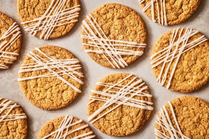 Crispy Brown Butter Cookies seen from above evenly spaced on a counter