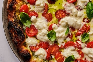 Overhead view of fresh baked caprese style NY pizza