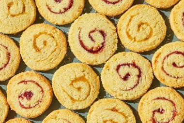 Any-Jam Pinwheel Cookies arranged tight together and seen from above